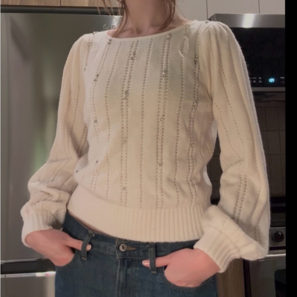 Chic Cream Sweater with Subtle Detailing